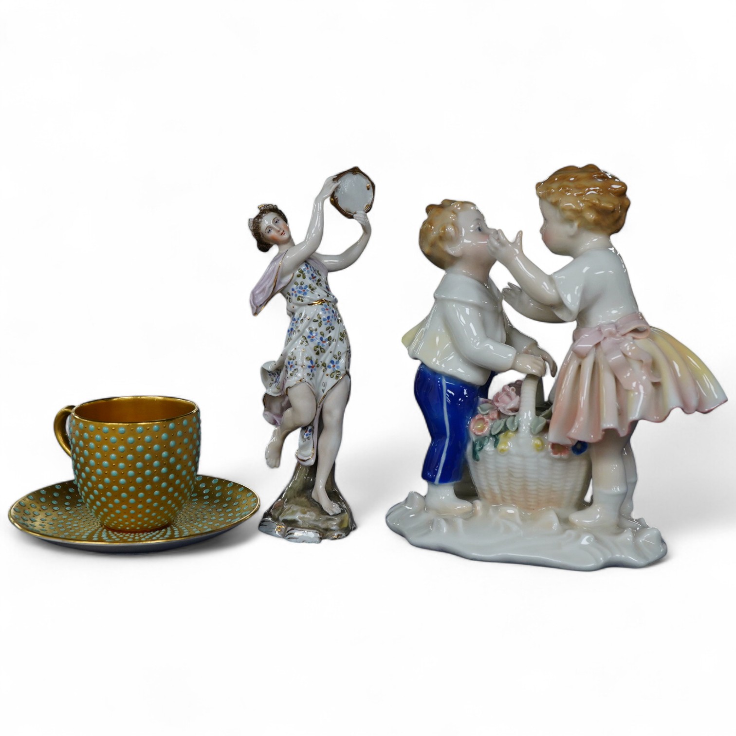 An early 20th century Coalport jewelled cabinet cup and saucer, a Karl Ens grop and a Plane figure